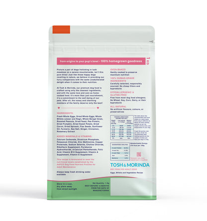 Back view of Tosh & Morinda's baked dog food packaging for the Eggs, Millets, and Vegetables Recipe variant. It shows the ingredients list, key features, and the feeding guidelines.